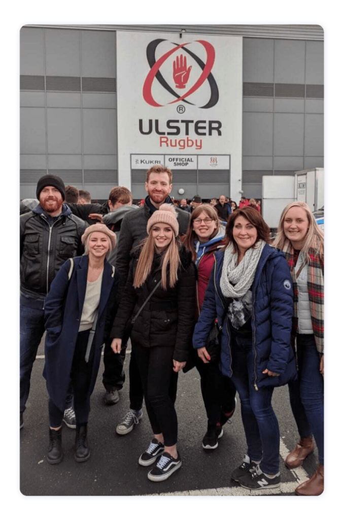 Astrid and the AuditComply team at an Ulster rugby game