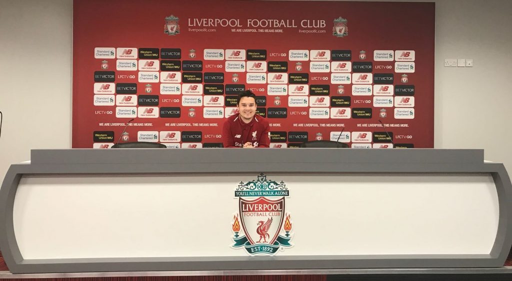 Picture of Daniel's favourite team Liverpool, holding a press conference.